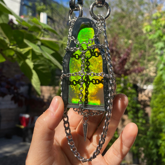 holographic caged wolf pendant